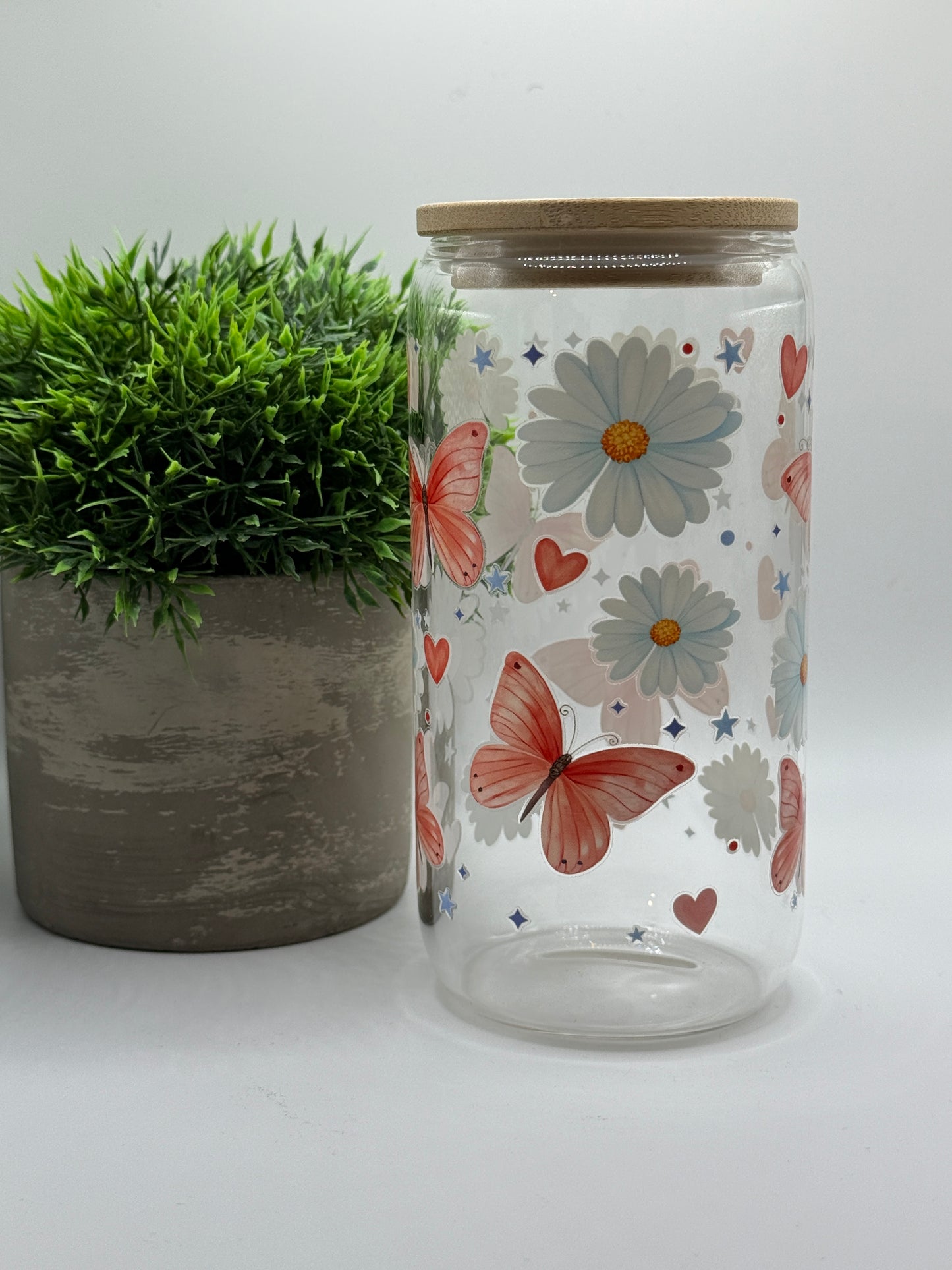 Trinkglas "Schmetterlinge mit Gänseblümchen" 16oz (473ml)